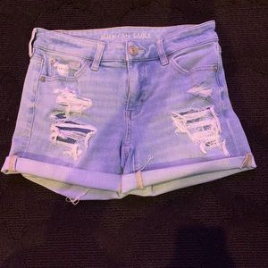 light blue ripped jean shorts